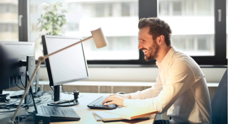Man using computer on table